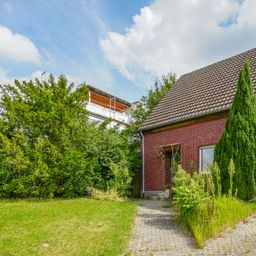 Freistehendes Einfamilienhaus mit sonnigem Grundstück!