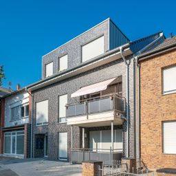 Helle Erdgeschosswohnung mit sonniger Terrasse, offenem Wohnkonzept und barrierearmer Gestaltung