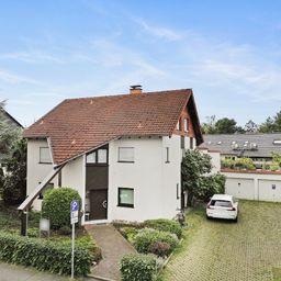 Zweifamilienhaus mit stillem Gewerbe, großer Wohnung und schönem Garten