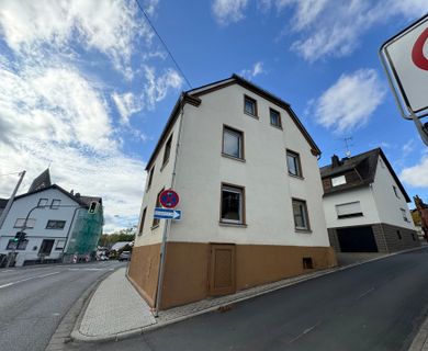 Gemütliches Einfamilienhaus mit Balkon auf einem kleinen Grundstück!