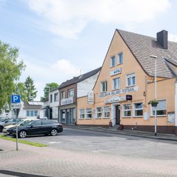 Sanierungsbedürftiges Wohn- und Geschäftshaus