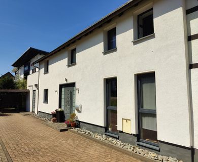 Moderne Doppelhaushälfte mit Carport und Dachterrasse mit herrlichen Ausblick!