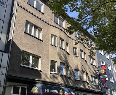 Renovierungsbedürftiges Wohn- und Geschäftshaus – Innenstadt